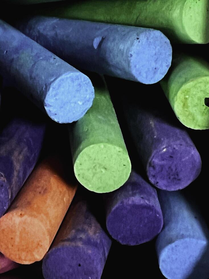 Colorful chalks stacked together,art stationary photo