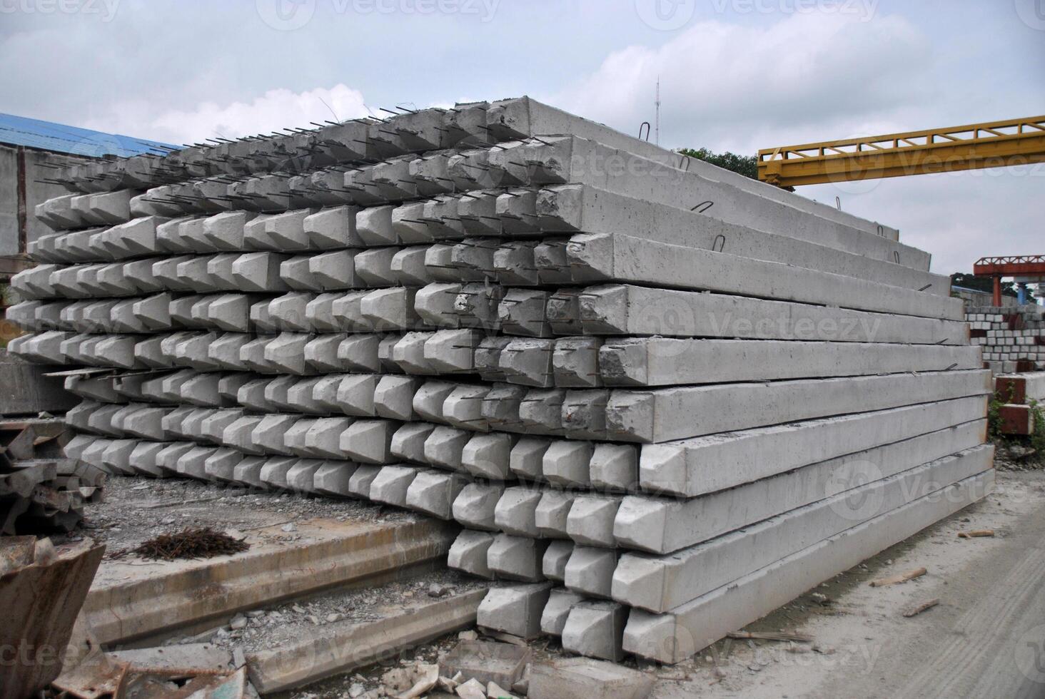 Square piles precast concrete used for foundation building or road construction photo