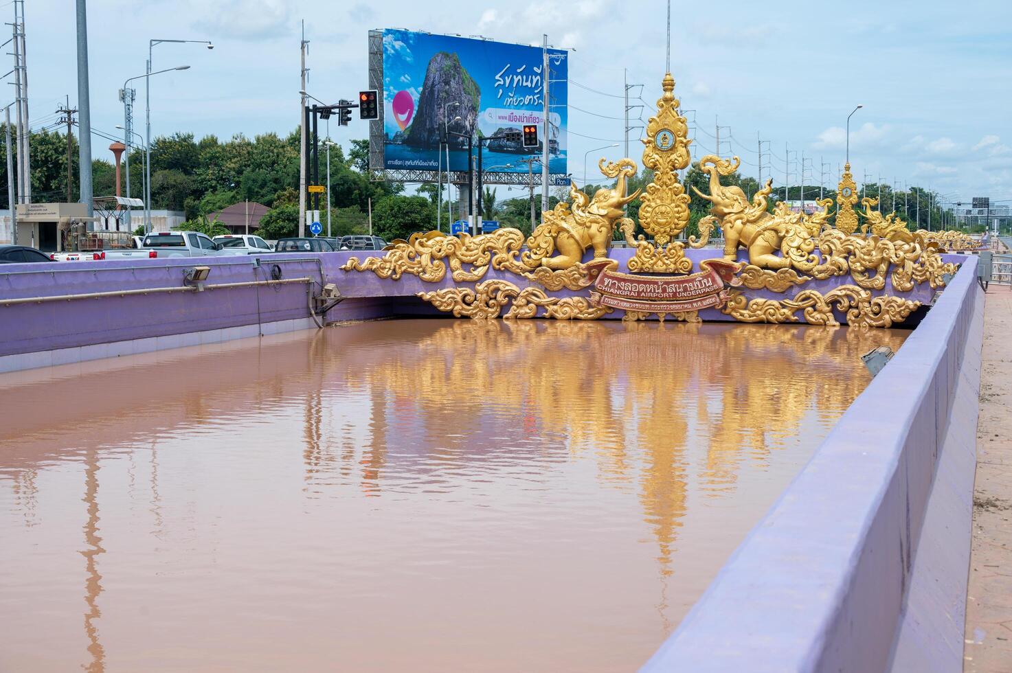 Chiang Rai, Thailand - 16-September-2024 - Water flooded the underpass in front of Chiang Rai airport after typhoon Yagi has swept Chiang Rai province of Thailand. photo