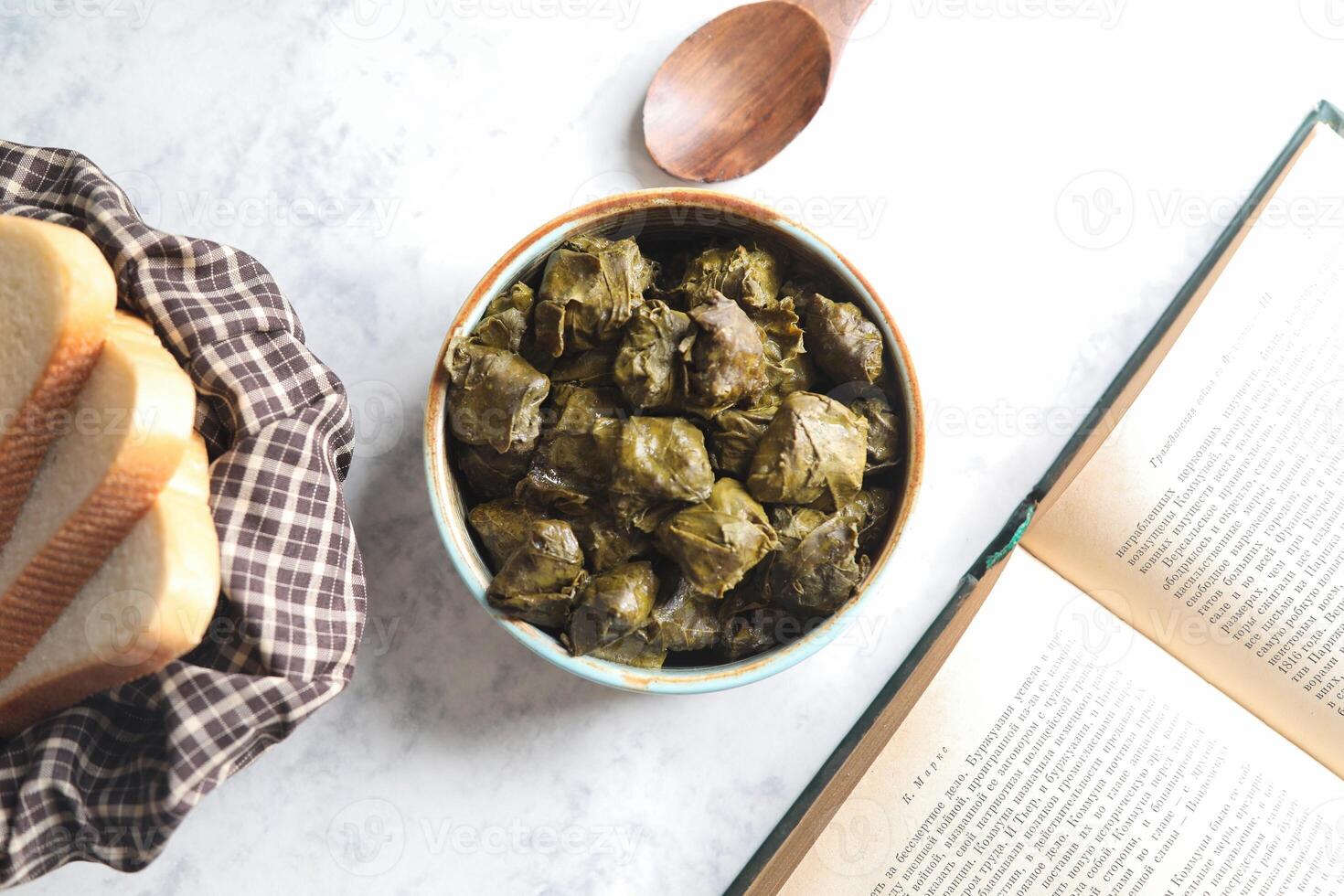 Stuffed Grape Leaves With Bread and Book photo