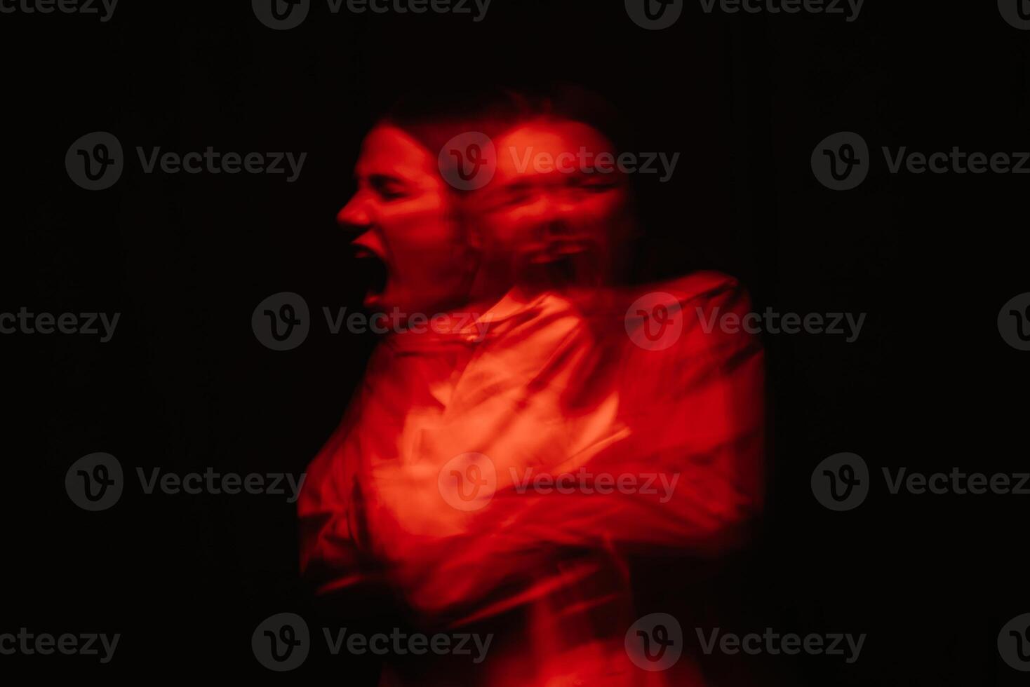 blurry portrait of a schizophrenic woman with paranoid disorders and bipolar disease photo