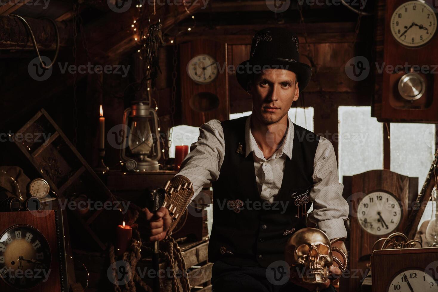 man in a steampunk suit with a cane and a top hat with a golden skull photo