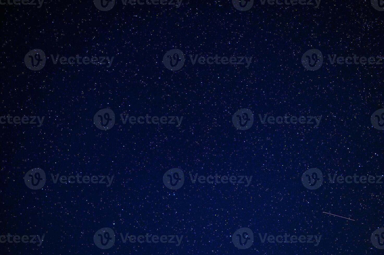 Night starry sky with stars, constellations, nebulae and galaxies at night. Abstract blue background photo