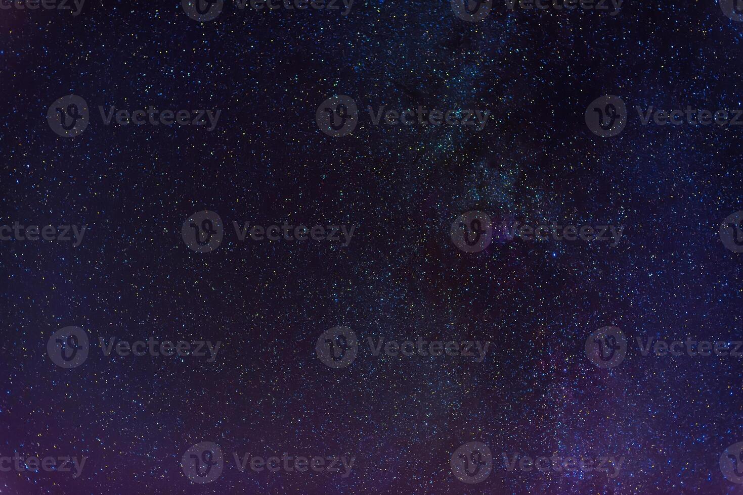 Multicolored starry sky with many stars and milky way at night. Scientific astrophotography of cosmos with galaxies, nebulae and constellations photo