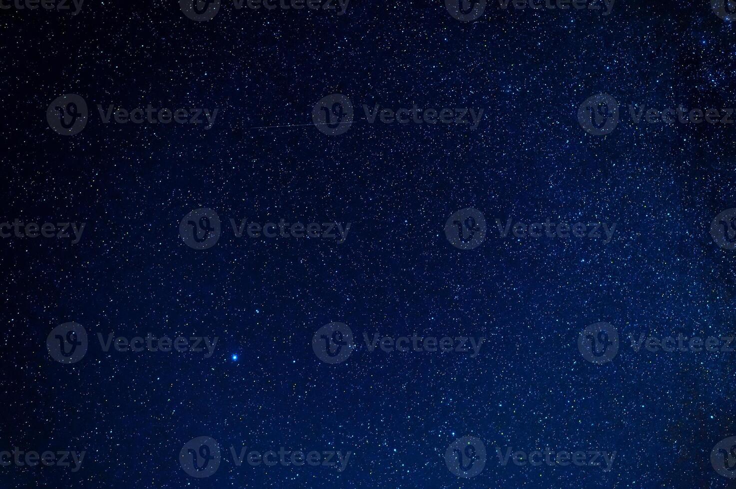 Stars on background of a starry dark sky at night photo