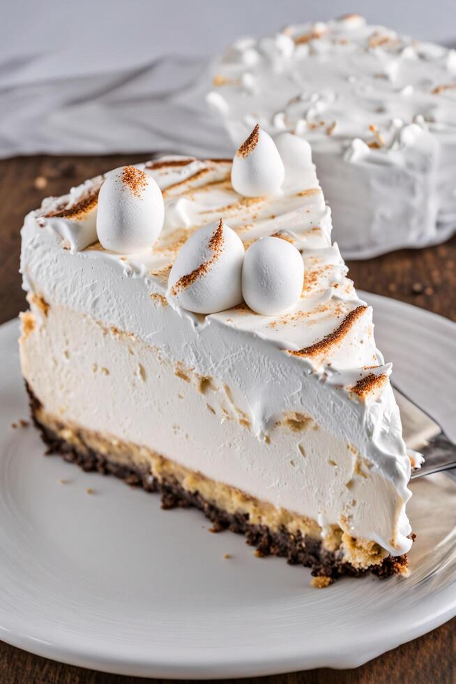 Creamy White Cake Slice with Meringue and Chocolate Crust photo