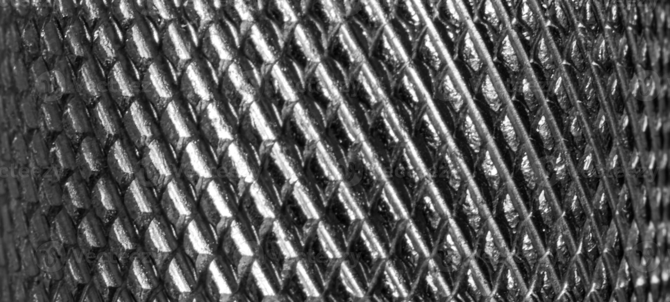 Metal texture with diamond pattern. Abstract background of steel. Banner. photo
