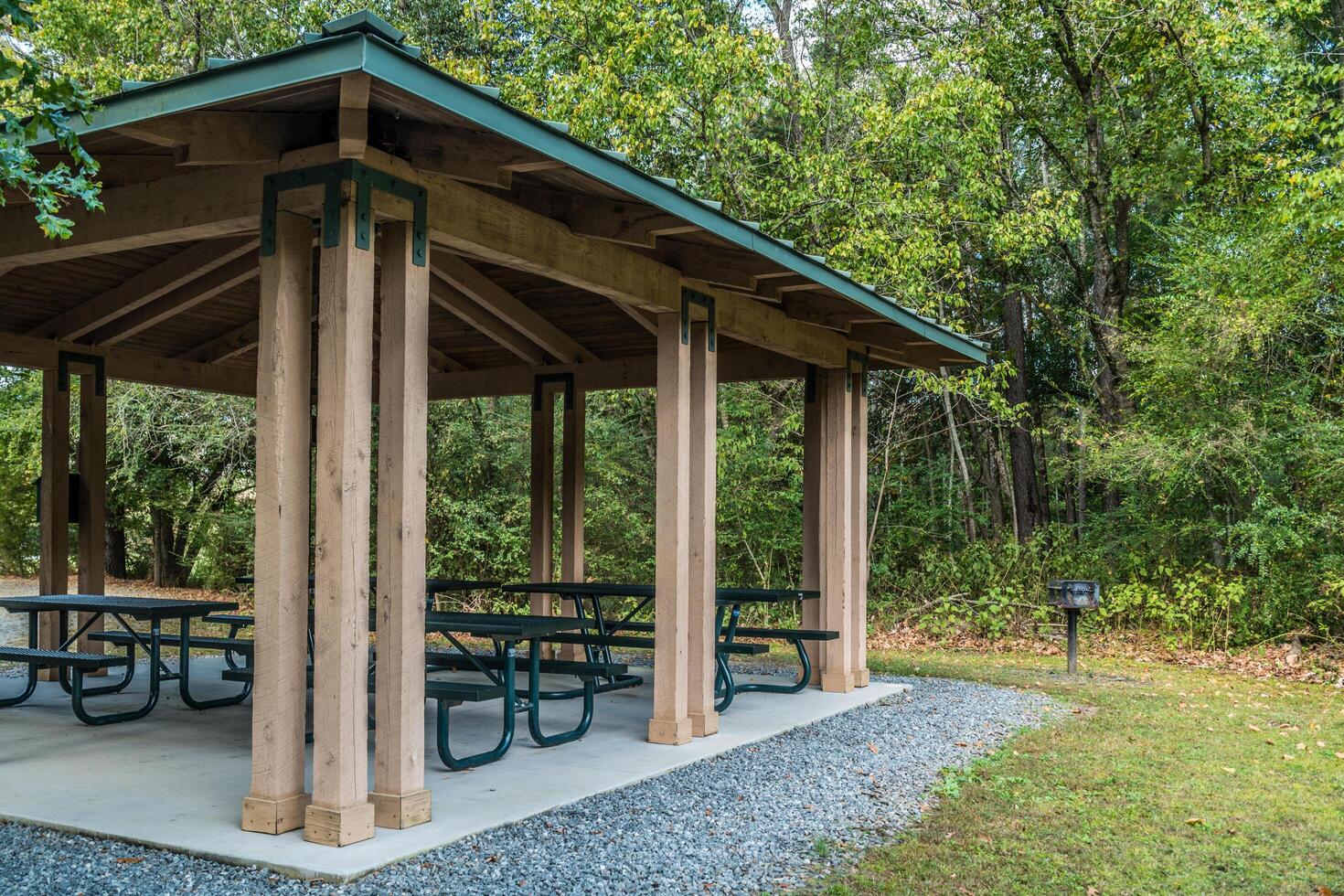 Covered picnic area with grill in the park photo