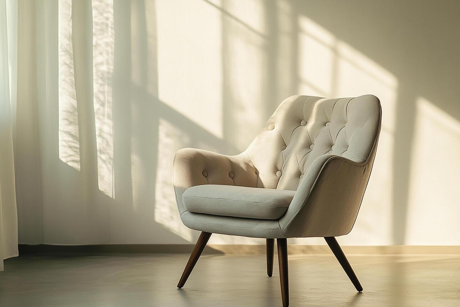 Chic modern chair with button tufts and angular wooden legs isolated photo