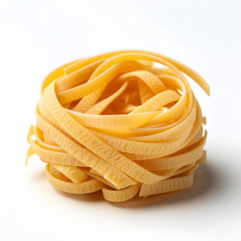 Italian egg pasta nest isolated on white background photo