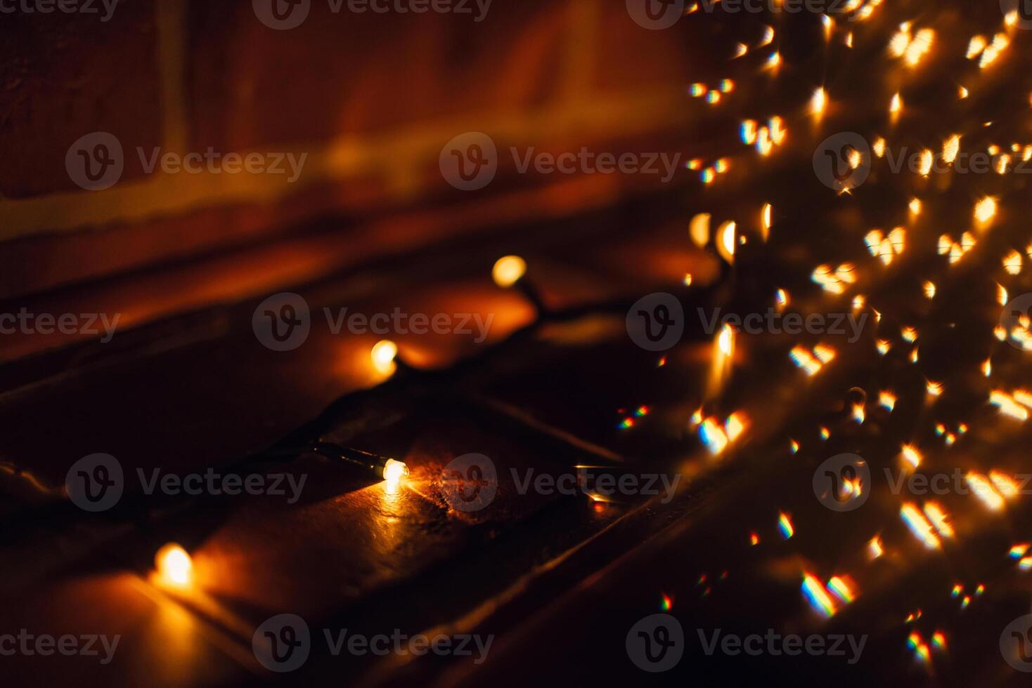 Christmas festive gold garland with yellow lights photo