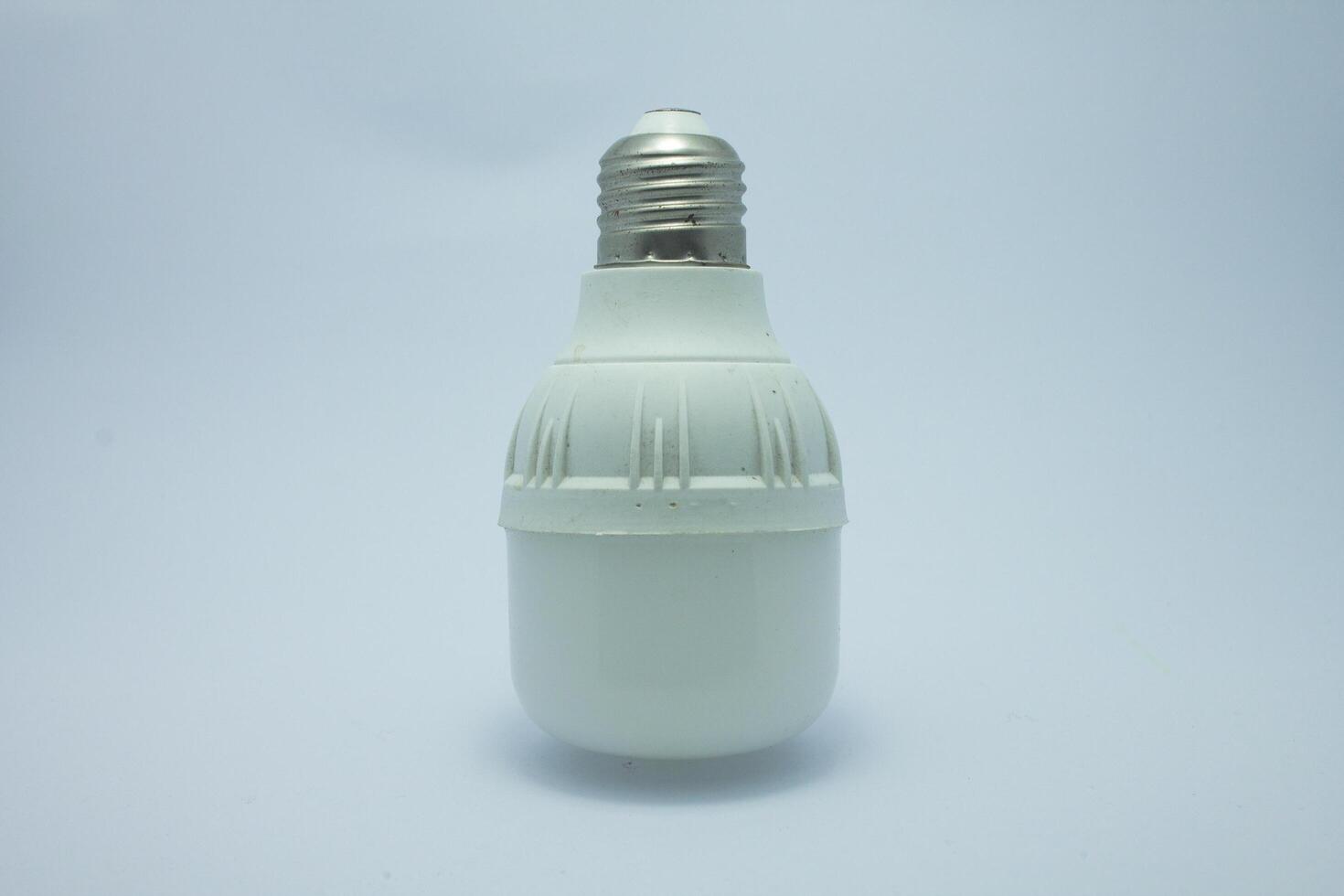 Energy saving led light bulb isolated white background photo