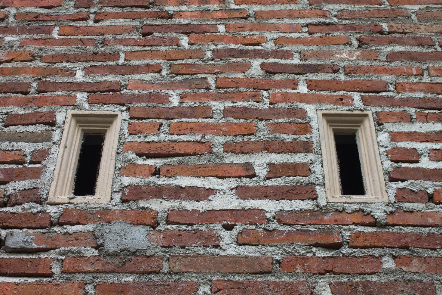 red brick wall texture background and ruster ventilation photo