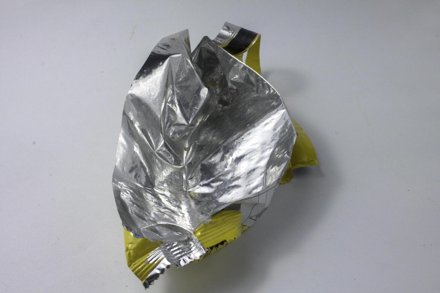 plastic foil waste from used snack wrappers photo