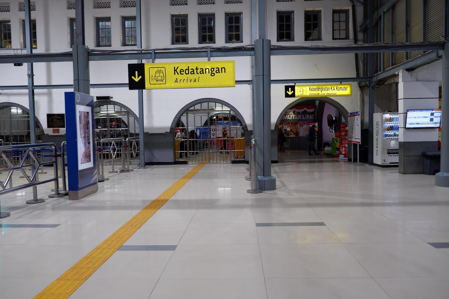 Arrival gate of Pasar Senen train station, Jakarta at night at Covid-19 pandemic. An empty arrival gate of train station Jakarta, Indonesia - August 2, 2020 photo