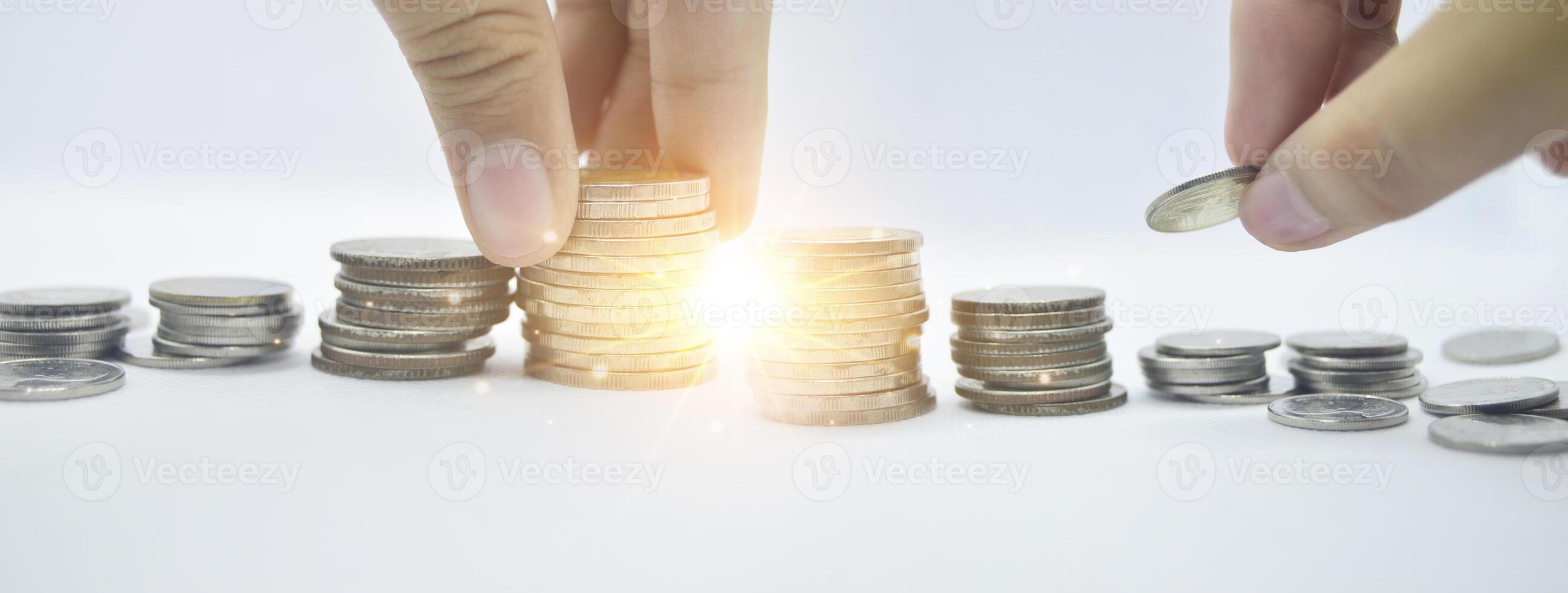 Image of stacked coins growing together indicating the growth of savings and investments over time. Stock photo with copy space.