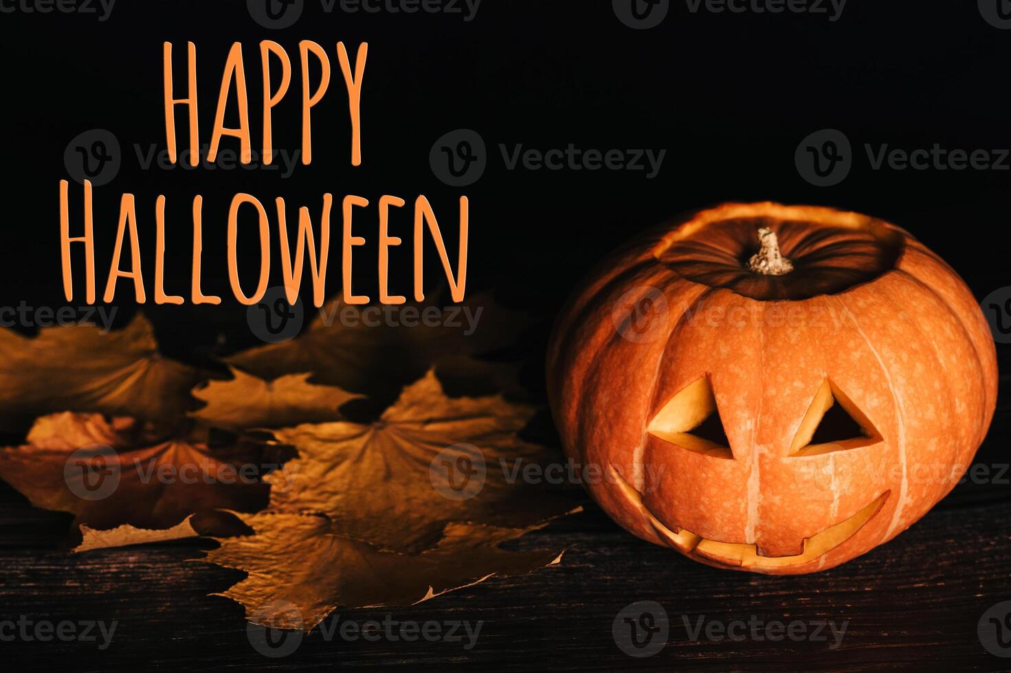 greeting card with text for Halloween celebration with orange pumpkin photo