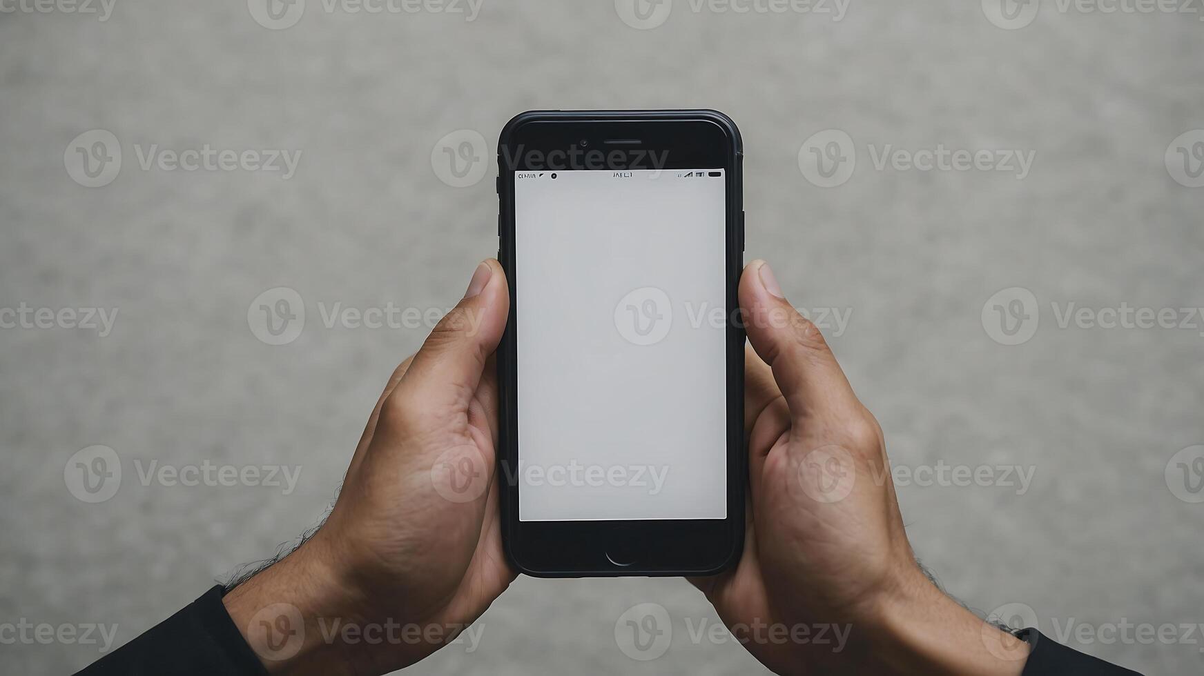 A person holding up a cell phone with a blank screen photo
