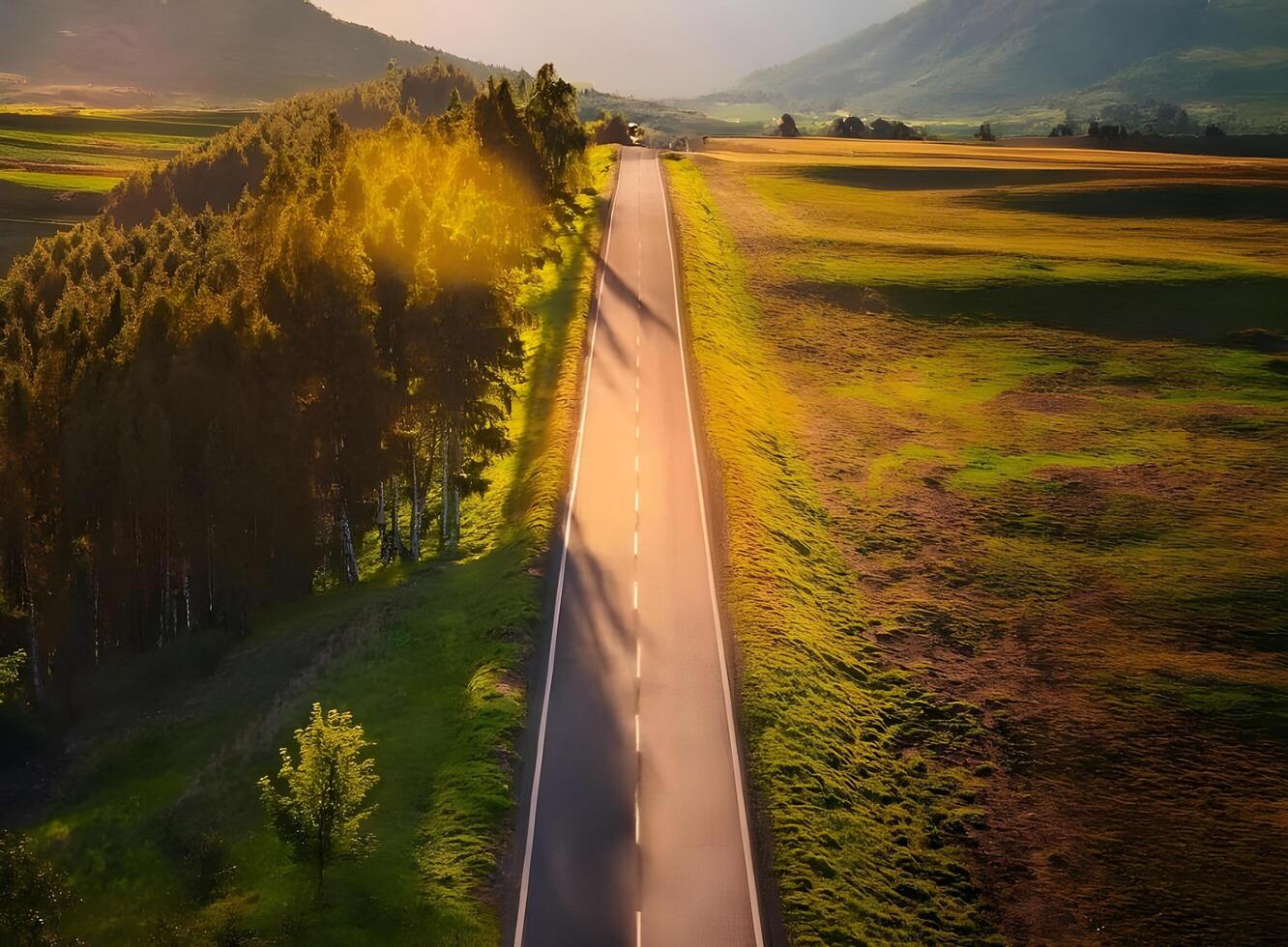 Asphalt highway and beautiful clouds landscape at sunset photo
