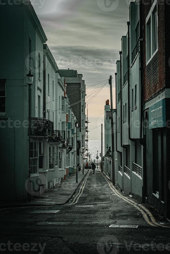 Street with old build houses in Brighton, East Sussex, UK photo