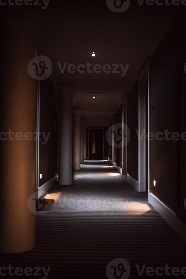 Long dark corridor in hotel building in York, Yorkshire, UK photo
