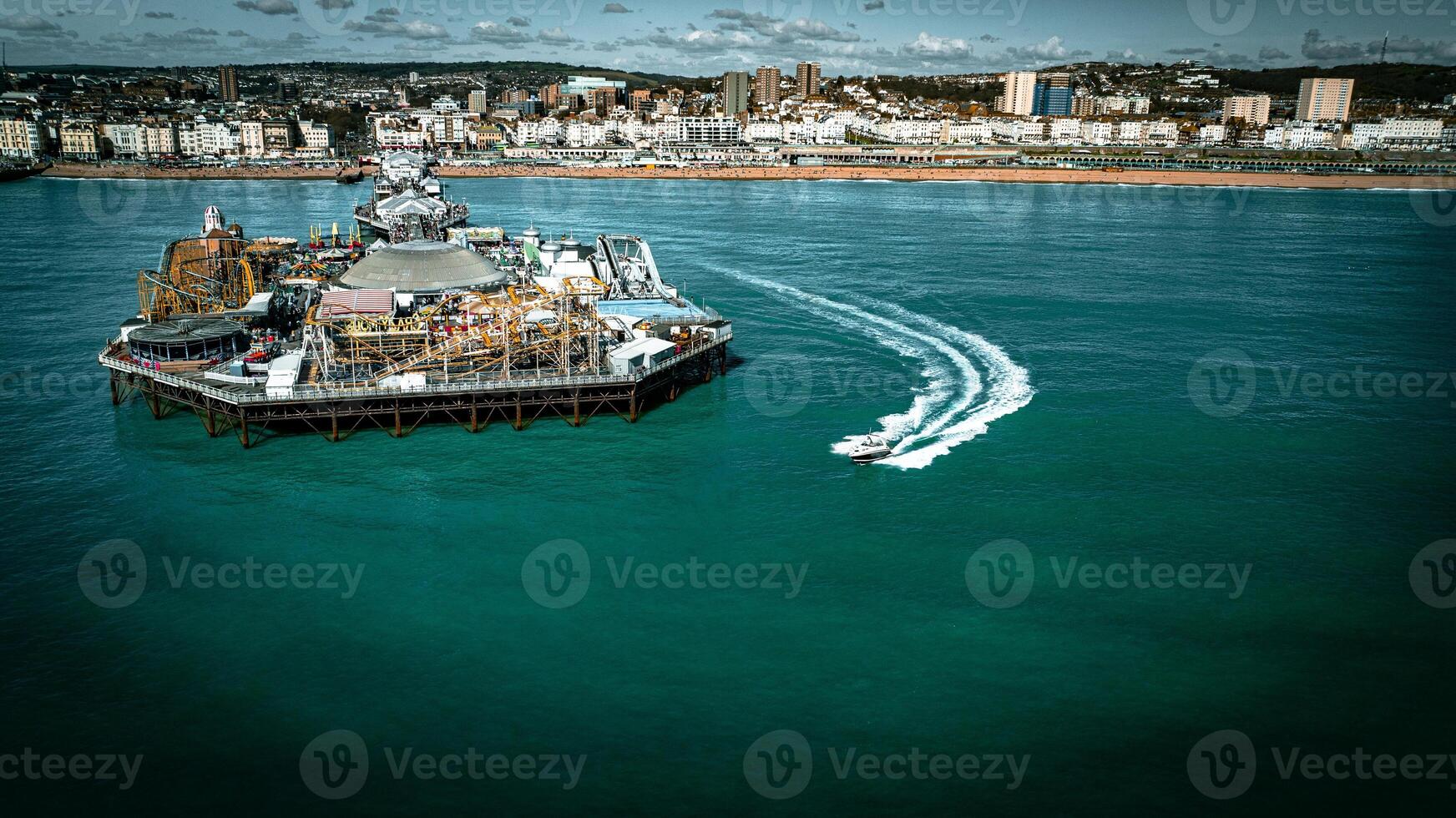 Aerial view of Brighton pier on a sunny day in summer. Brighton, East Sussex, UK photo