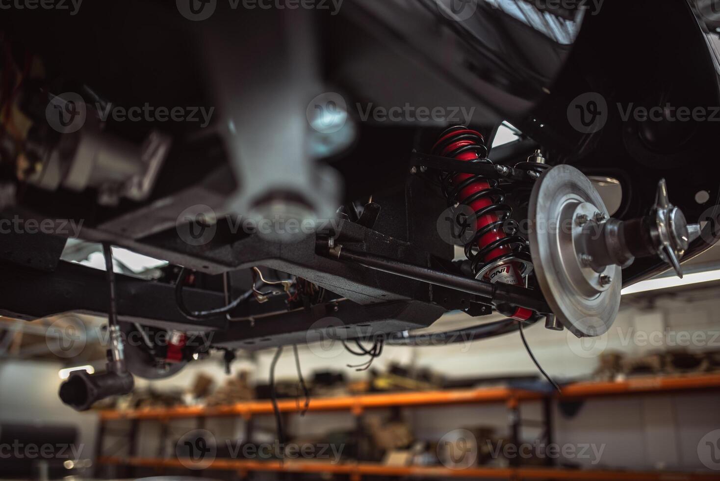 Classic cars being restored in a vintage vehicle garage workshop photo