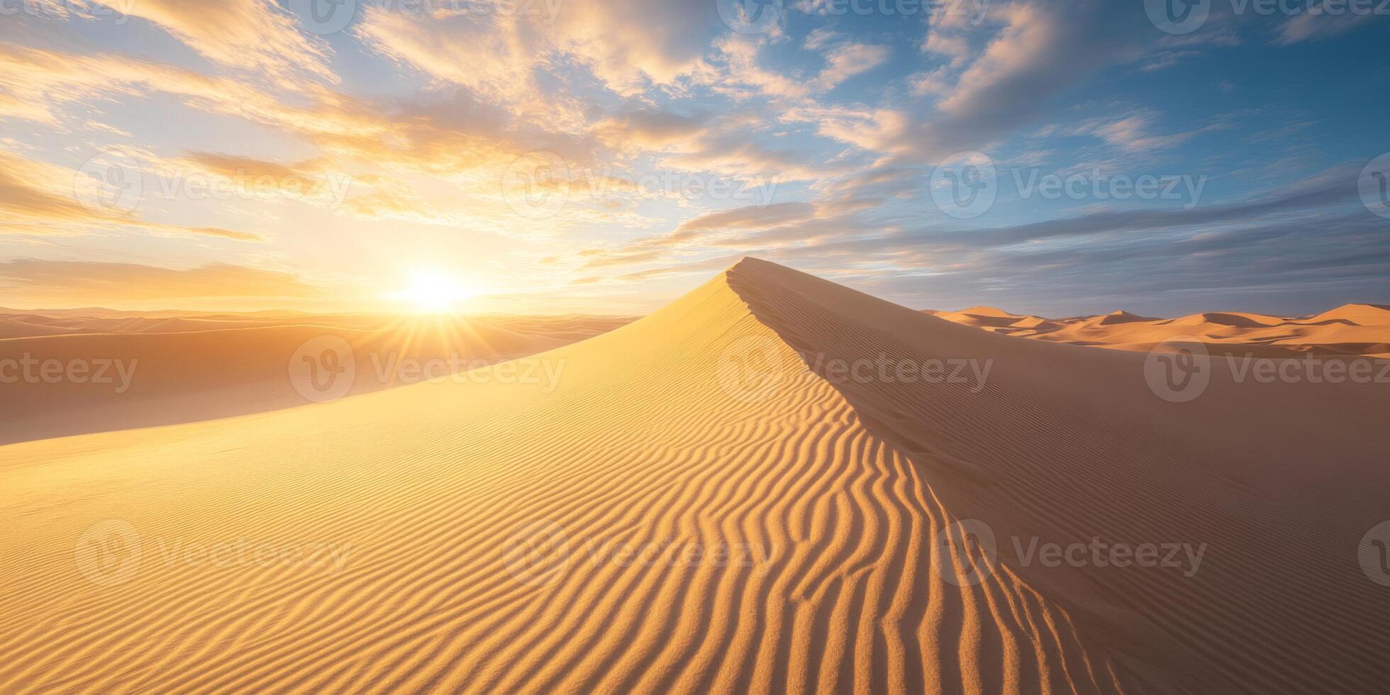 Rippled sand patterns leading towards towering dunes, soft sunlight photo