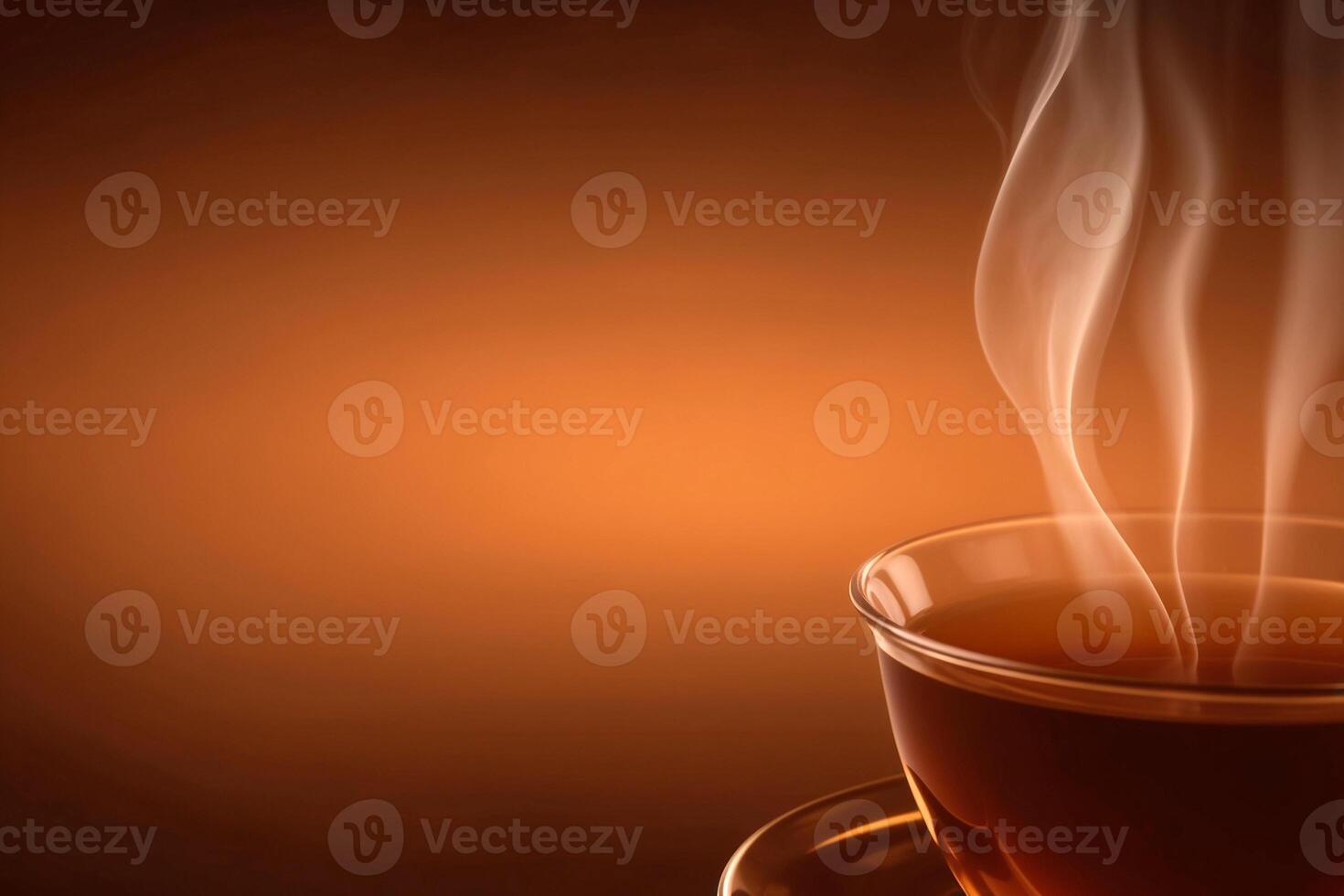 Cup of hot tea with smoke on brown background. Copy space. photo