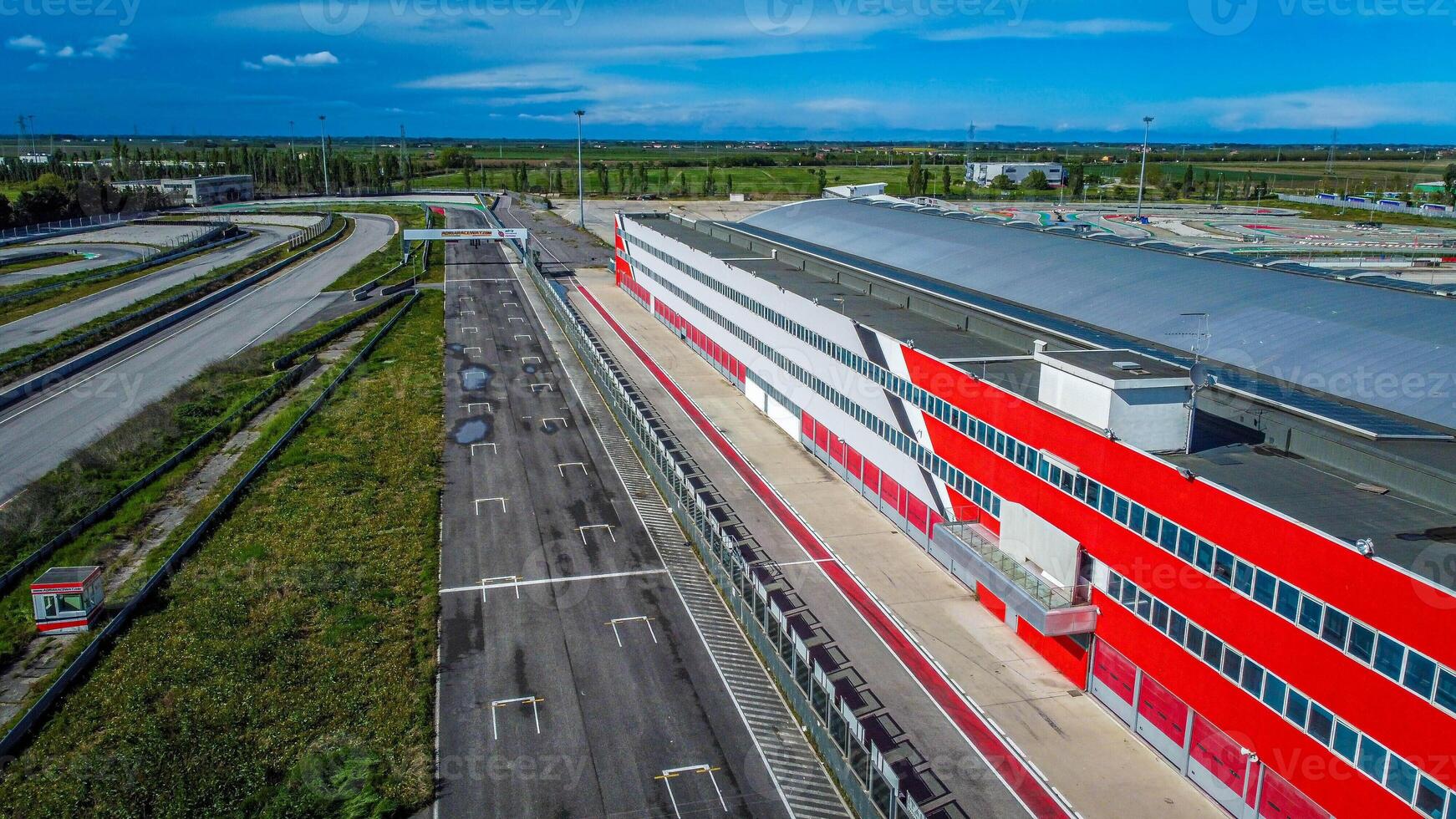 Adria racing circuit in Italy. Track abandoned for a few years where many cars and motorbikes raced. Current topic aerial view. photo