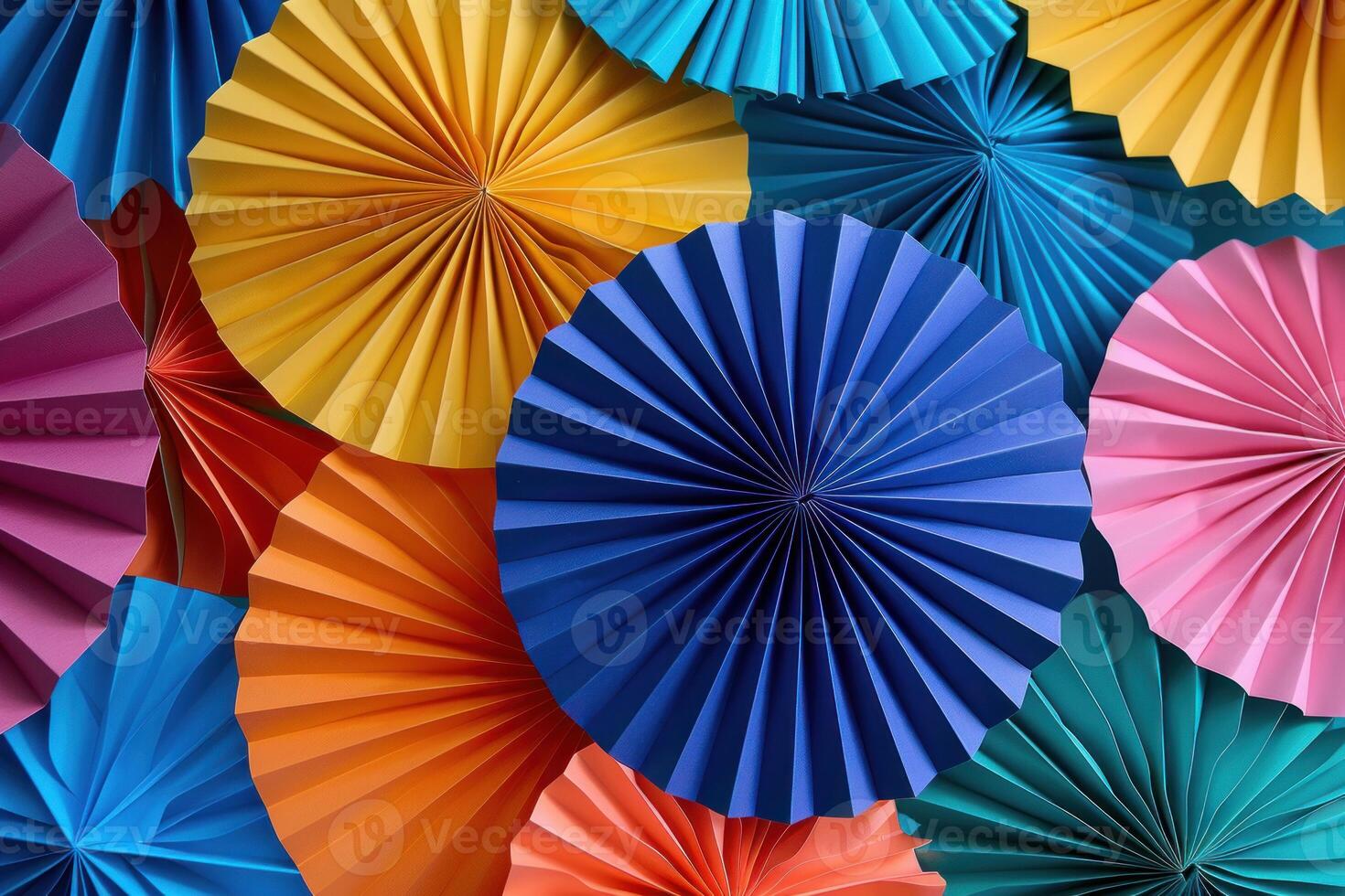 Colorful paper fans creating festive background texture photo