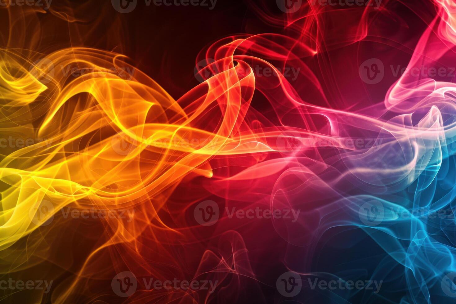 Colorful smoke forming abstract shapes on black background photo