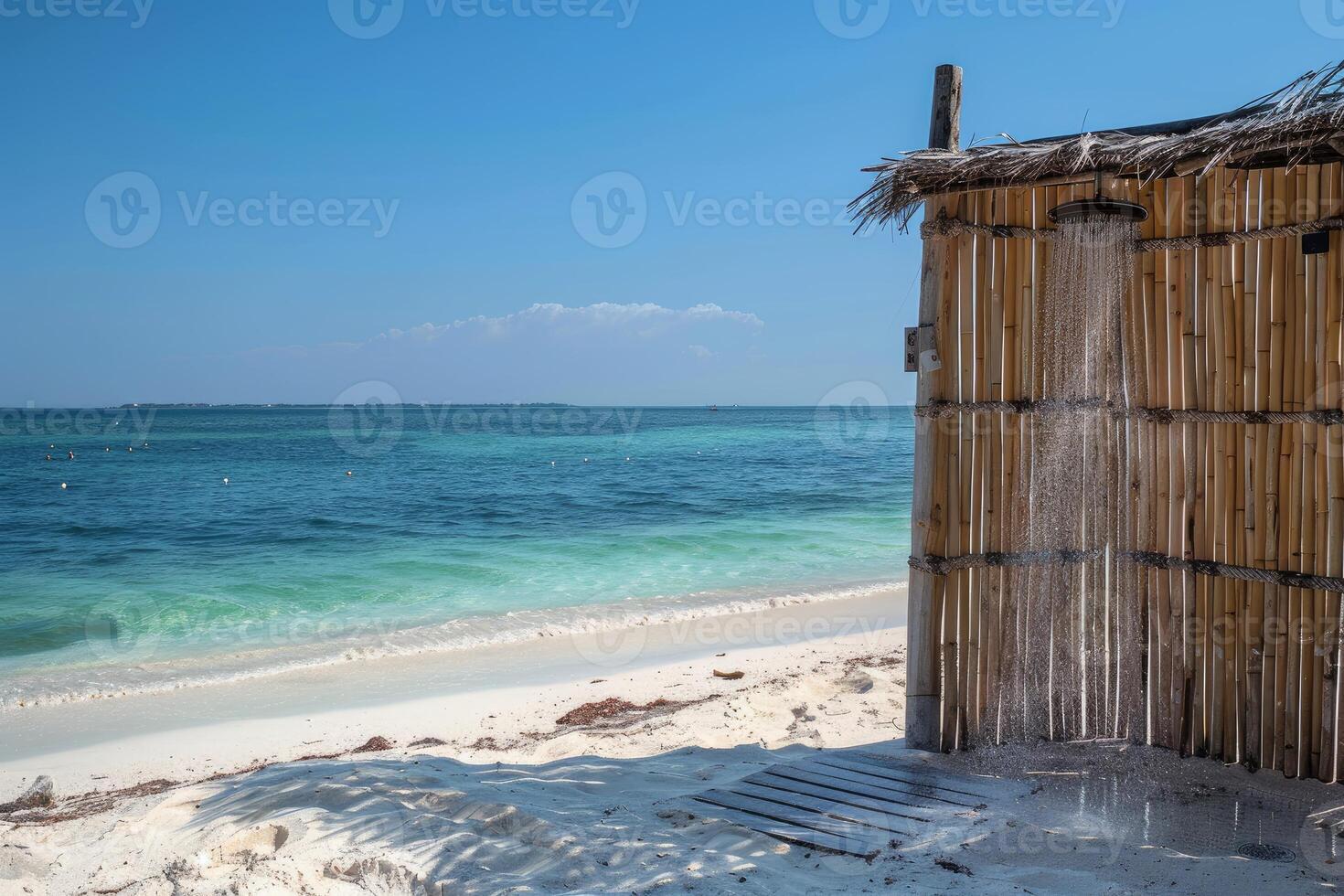 Outdoor beach shower running with water on tropical beach photo