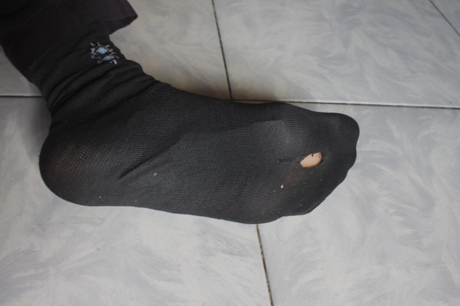 socks with holes in the soles photo