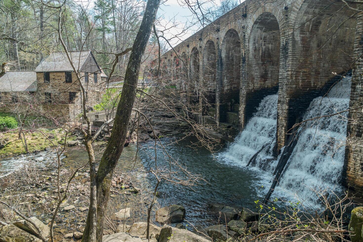 Backside of a old stone bridge photo