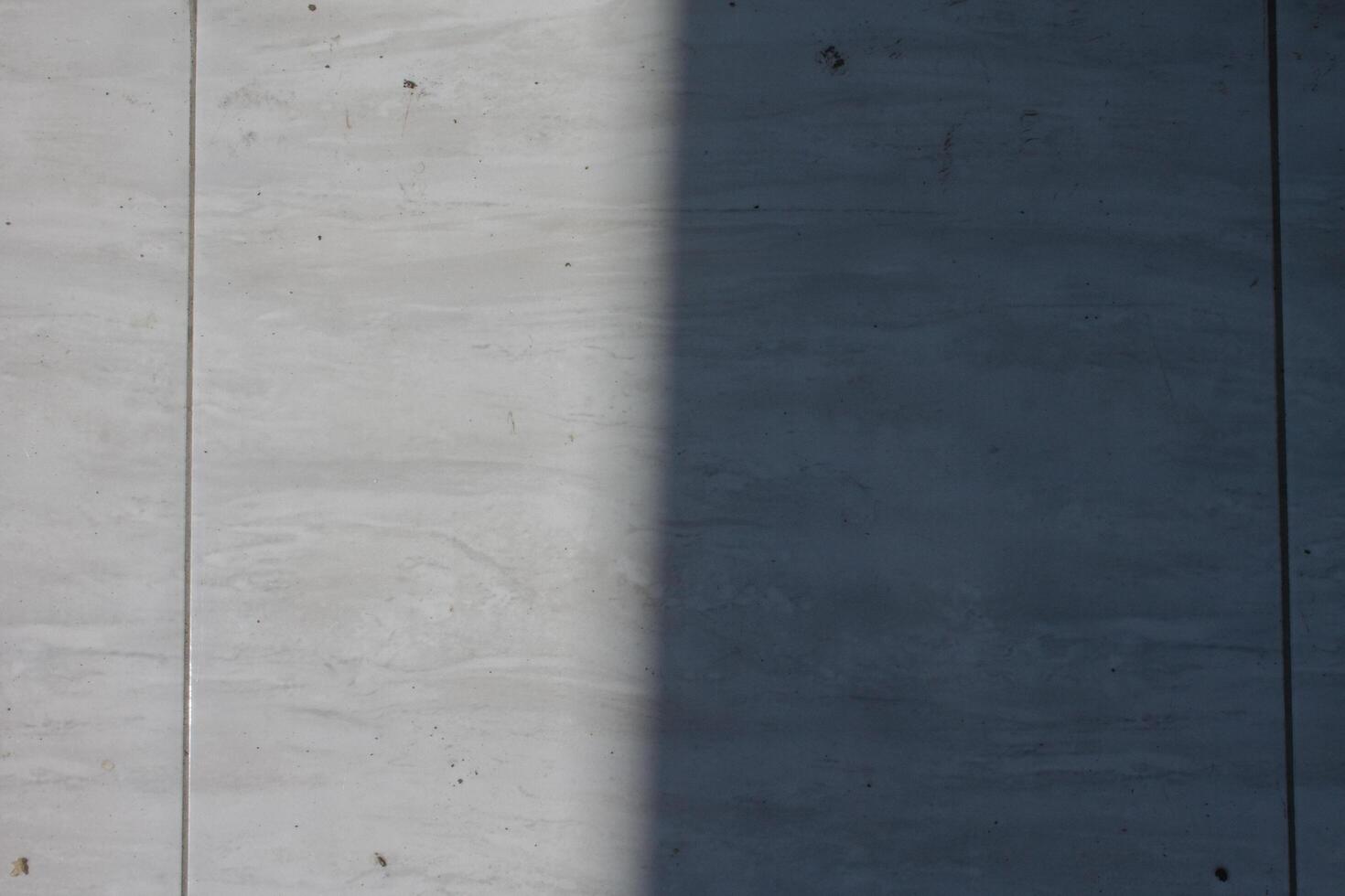 Light and shadow on tile floor photo