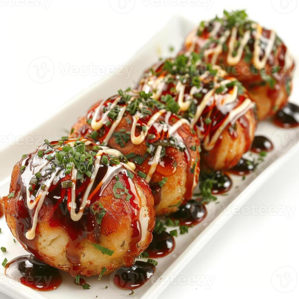 three pieces of food on a plate with sauce and sauce photo