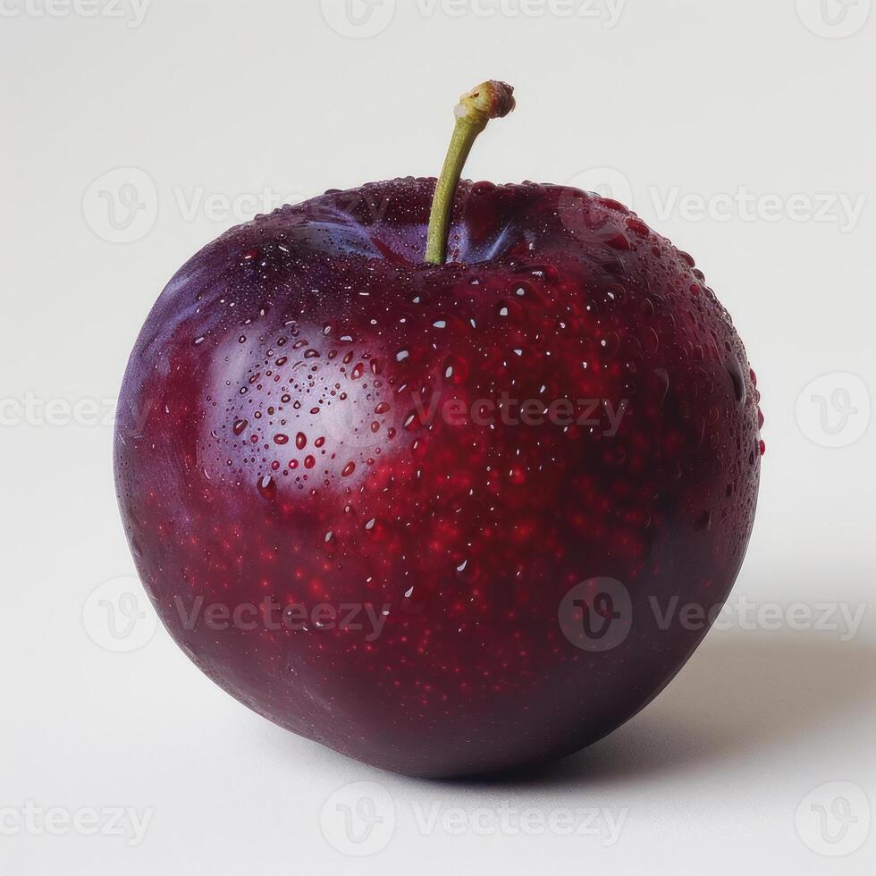 a red apple with water droplets on it photo