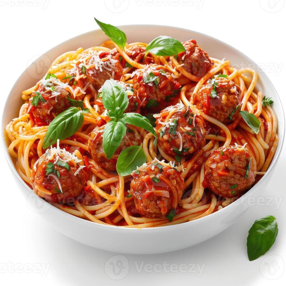 arafed bowl of spaghetti and meatballs with basil leaves photo
