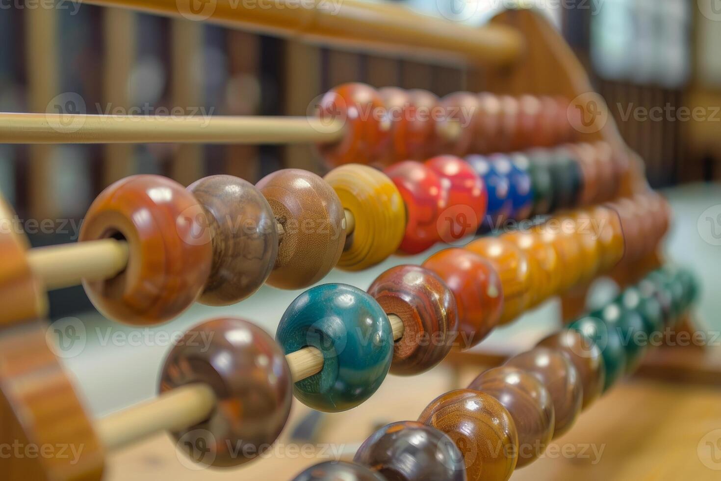 Wooden abacus showing colorful beads for calculating photo