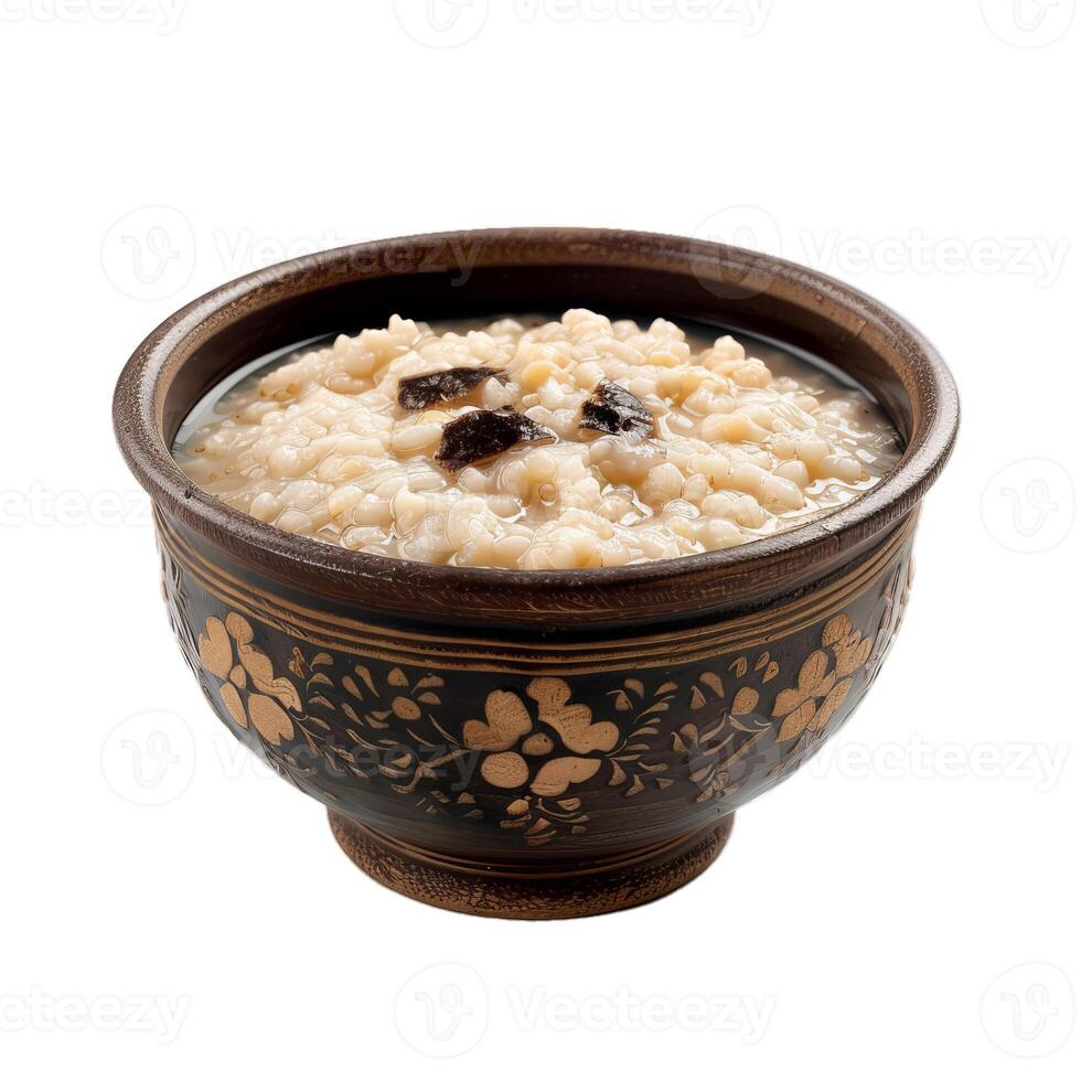 Steaming bowl of porridge with mushrooms on a white background photo