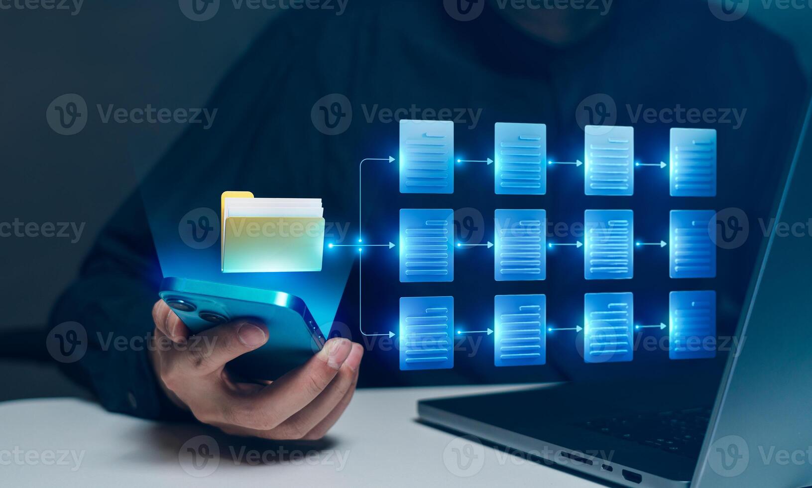 Document management system concept with smartphone and laptop photo