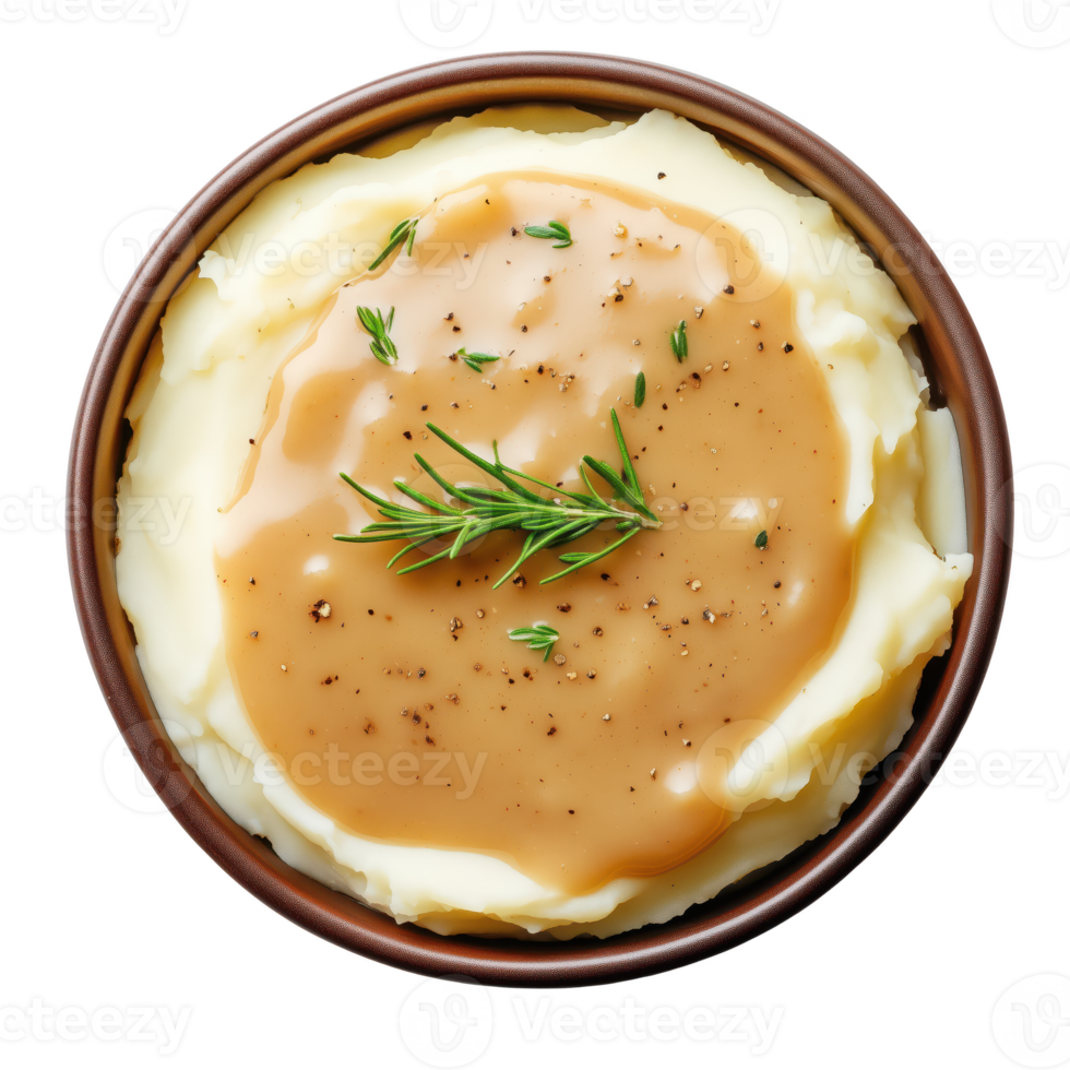 A bowl of creamy mashed potatoes topped with rich brown gravy and garnished with fresh herbs. isolated on transparent background png