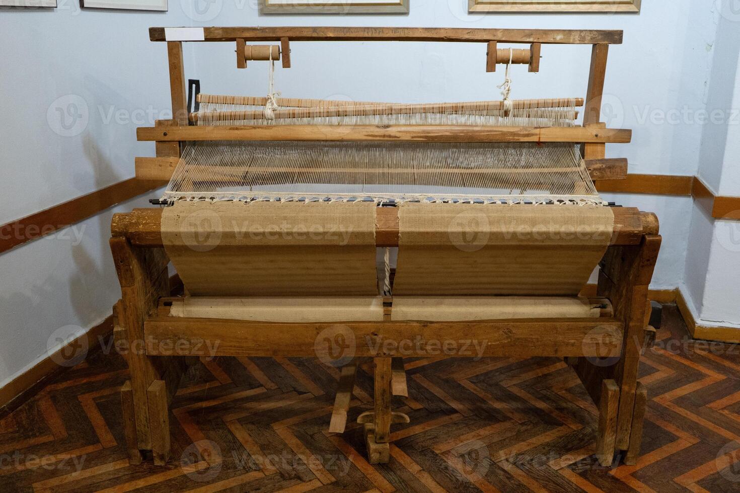Wooden loom. Weaving hand old machine. Weave photo
