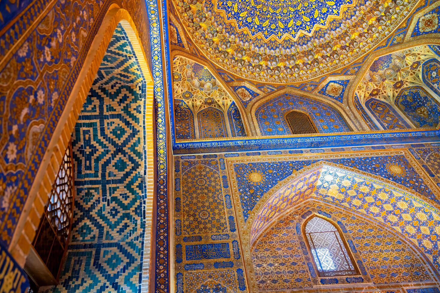 Samarkand, Uzbekistan-august 12, 2023-Interior of the Tilla-Kari Mosque in the Registan Square in Sammarkand during summer day photo