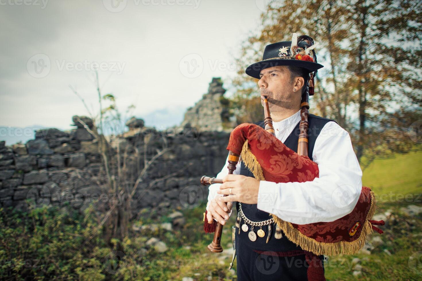 The bagpipe played in the mountains photo