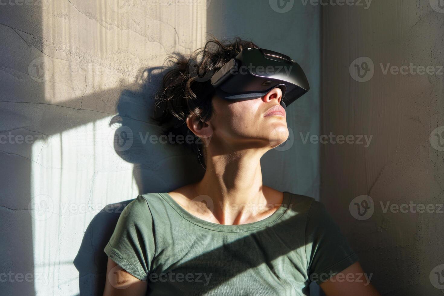 Mixed race woman wearing a virtual reality headset as a therapy and meditation. Mental health with new technology photo