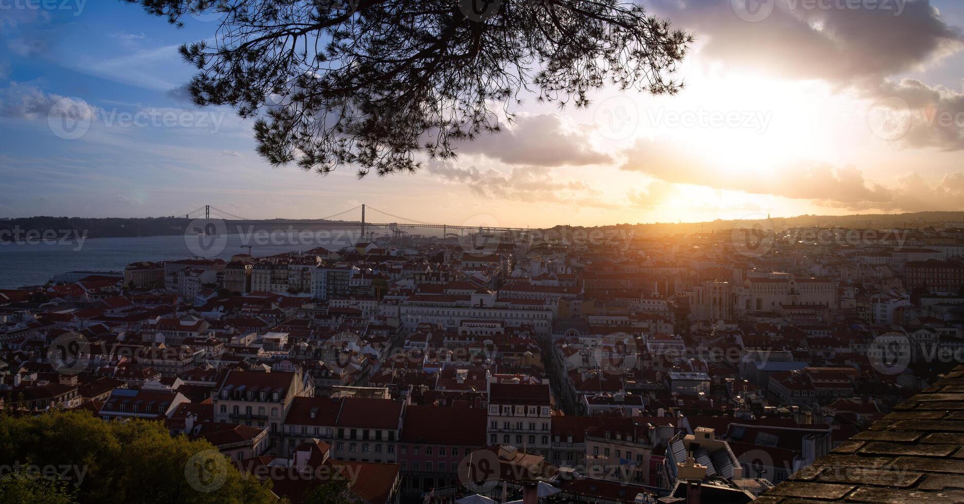 Scenic panoramic views of Lisbon and 25 of April bridge from Saint George Castle Sao Jorge lookout photo
