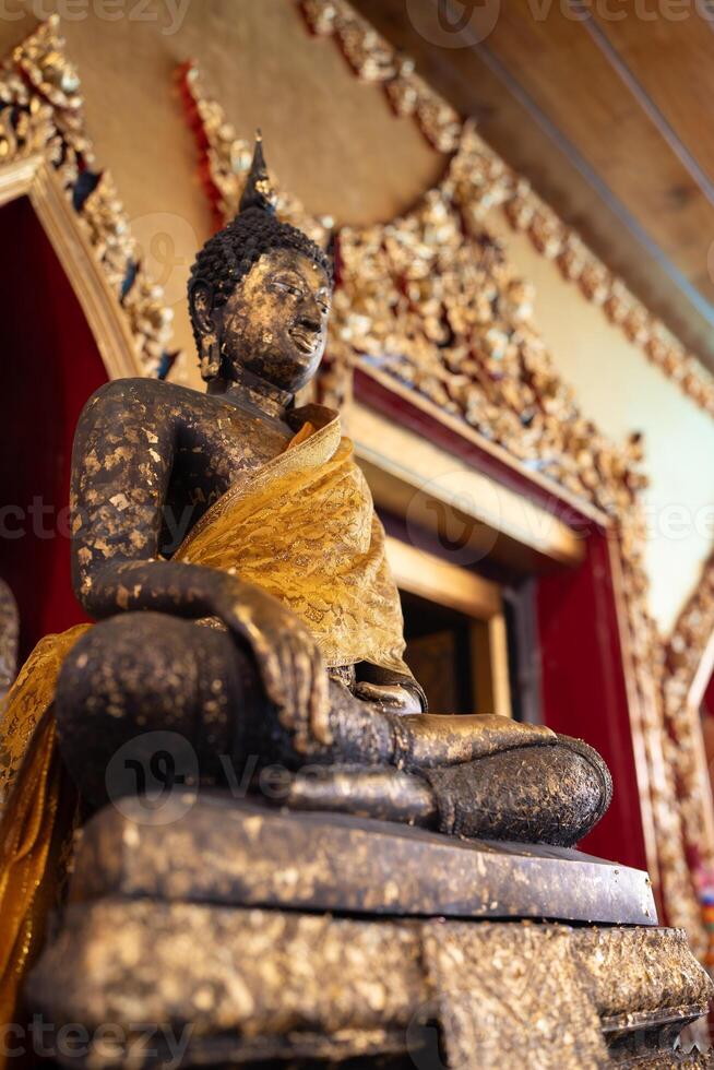 Buddha statue at Luang Pho To Temple or Wat Bangplee Yai Nai, Samut Prakan Province, Thailand photo