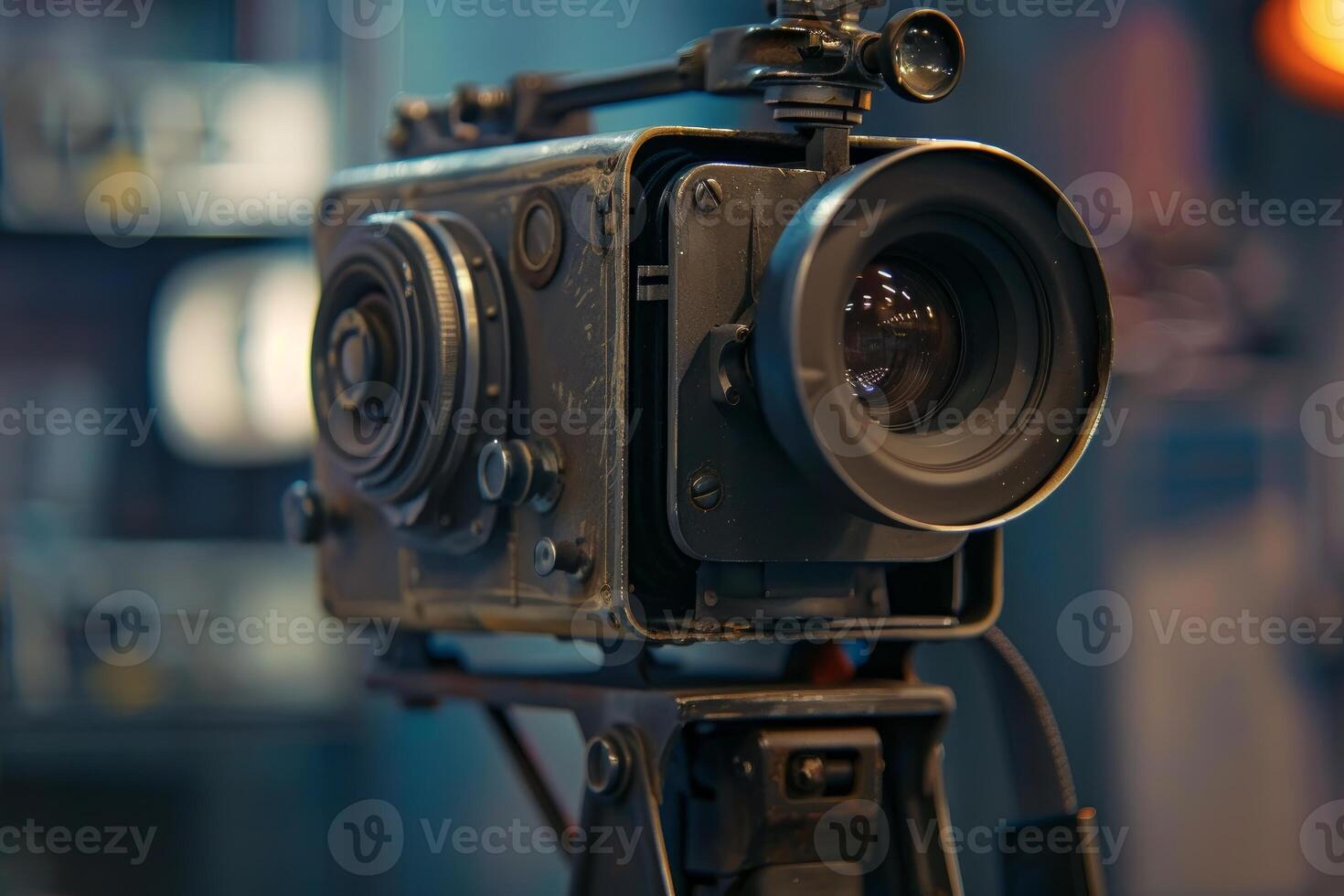 Old style professional movie camera standing on tripod photo